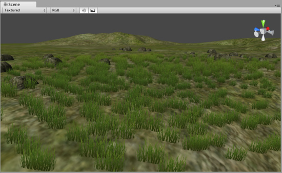A Unity terrain with lots of grass and rocks